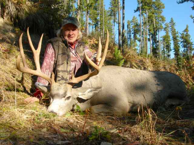Photo of Susan Tuohy with her high and heavy 2005 Alberta Mountain Muley